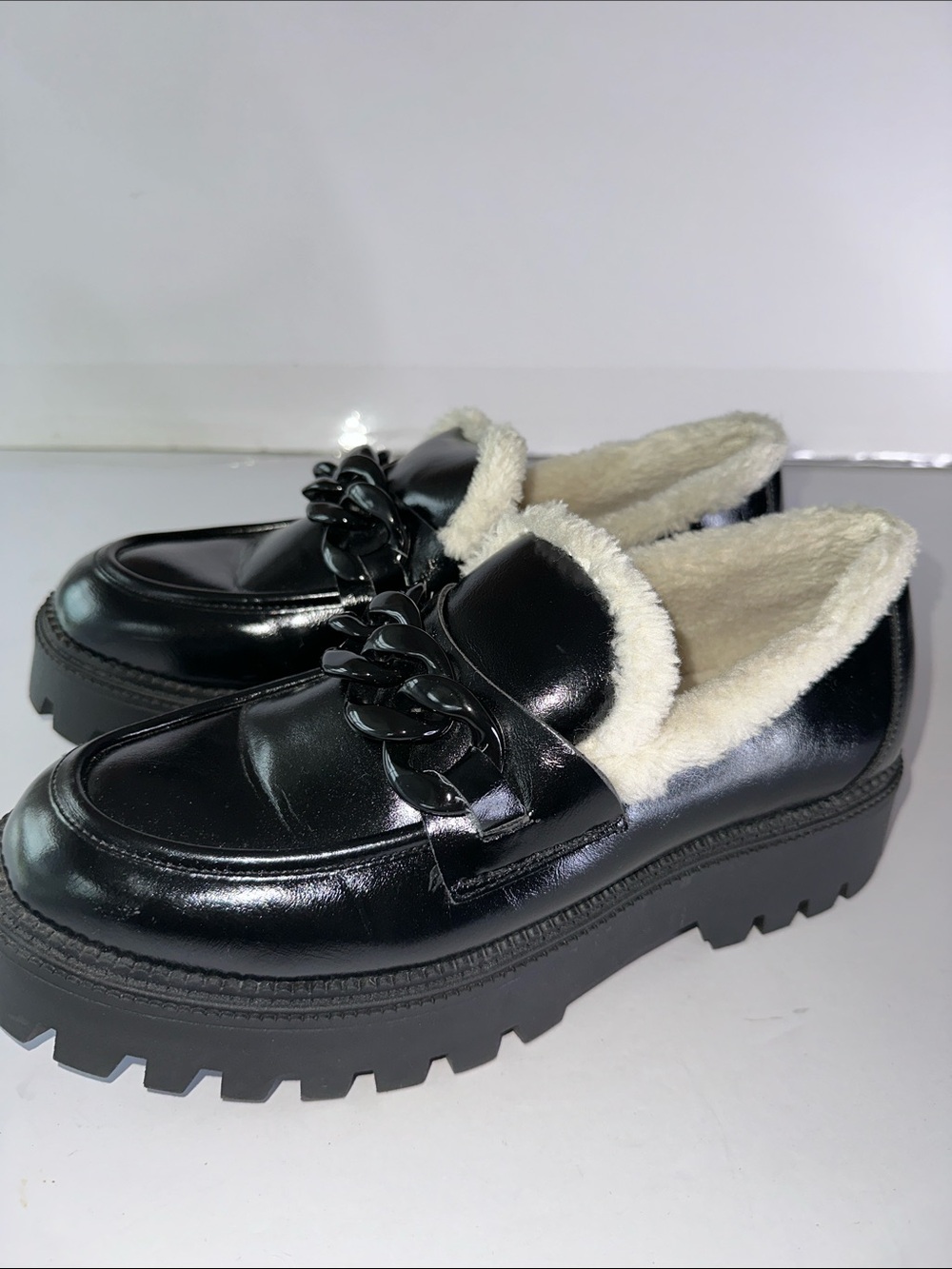 Dolce Vita Black Faux Leather Chain-Trim Loafers with Cream Sherpa Collar